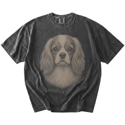 A realistic drawing of a Cavalier King Charles Spaniel on a Pepper Comfort Colors® T-shirt