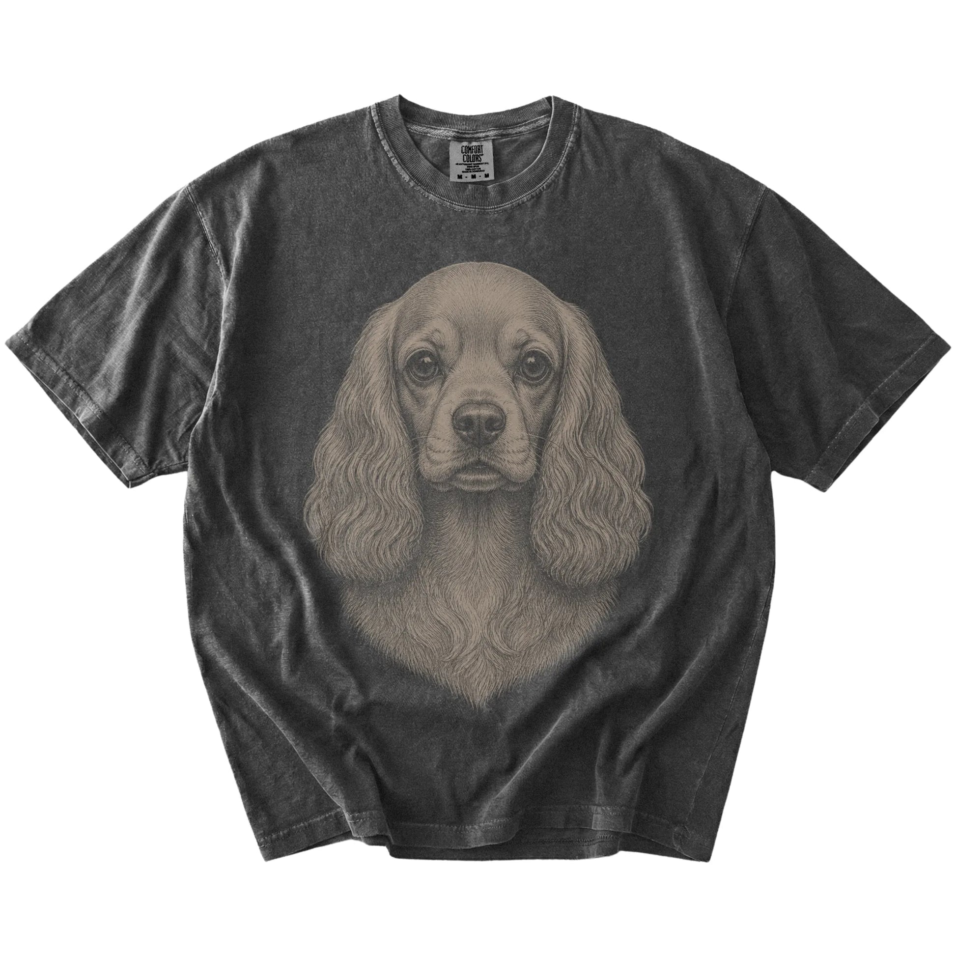 A realistic drawing of a Cocker Spaniel on a Pepper Comfort Colors® T-shirt