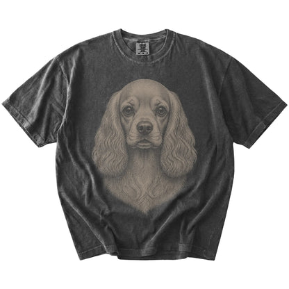 A realistic drawing of a Cocker Spaniel on a Pepper Comfort Colors® T-shirt