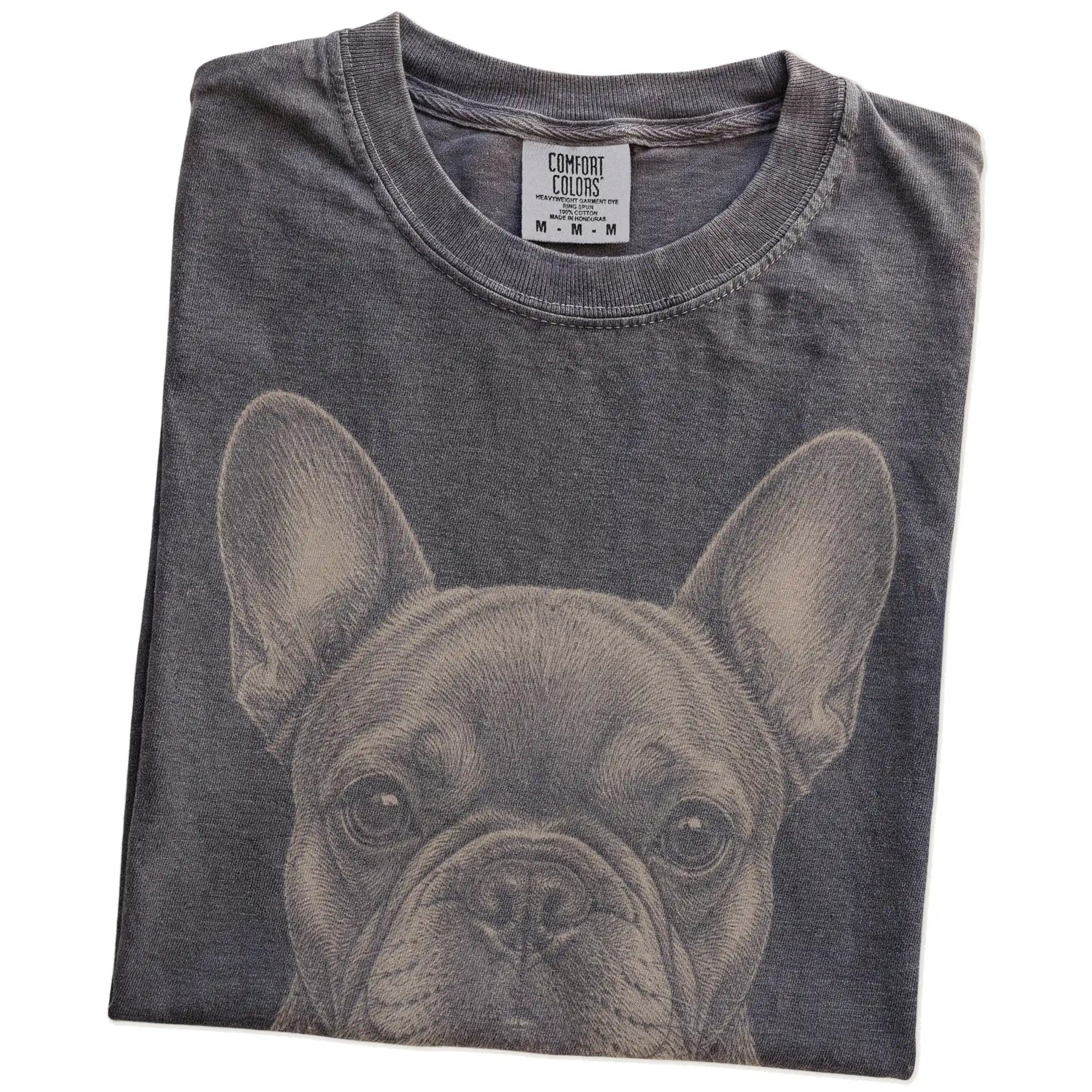 Folded Pepper Comfort Colors® T-shirt showing a realistic drawing of a French Bulldog