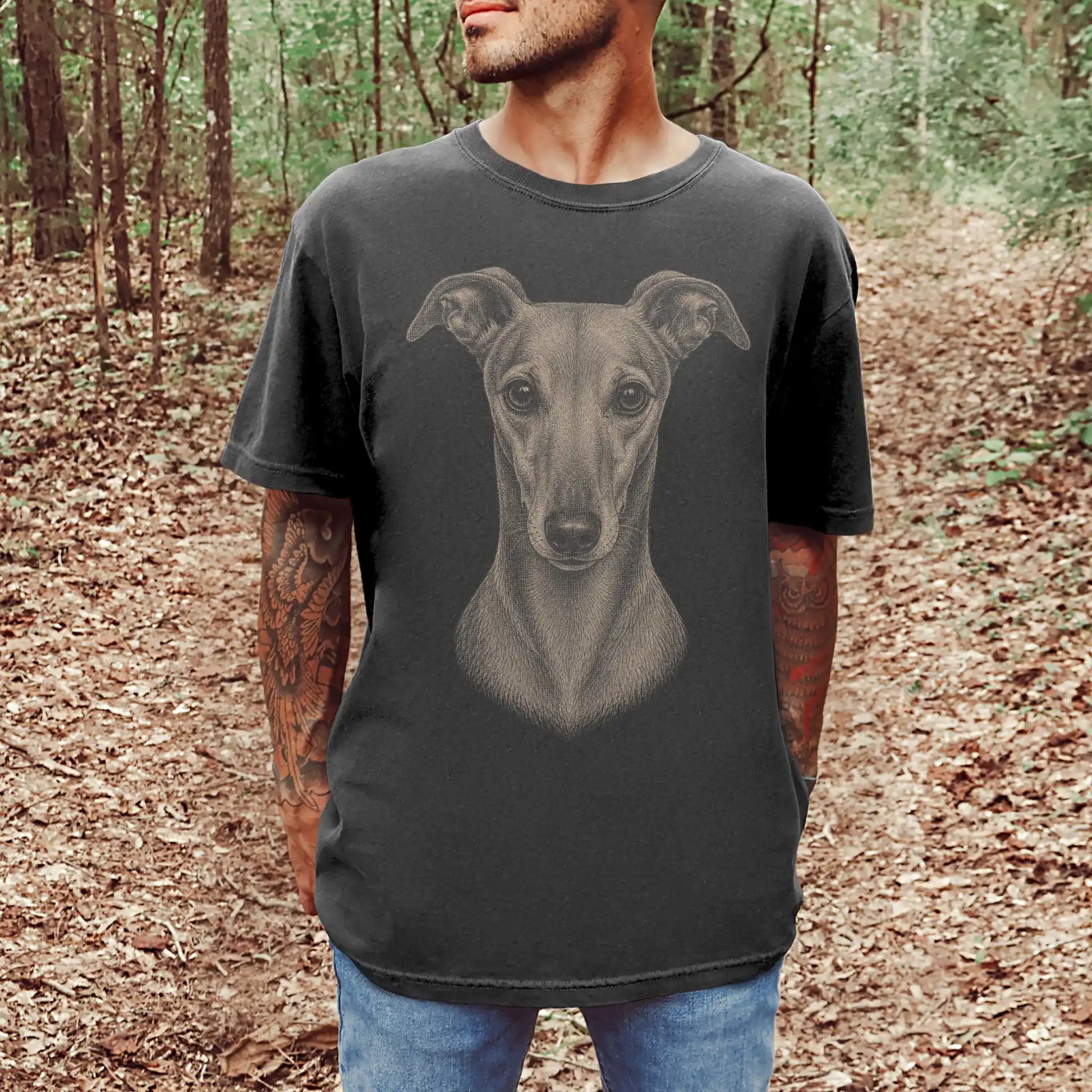 Model wearing a Pepper Comfort Colors® T-shirt with a realistic drawing of a Greyhound
