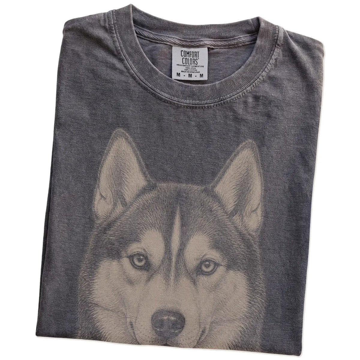 Folded Pepper Comfort Colors® T-shirt showing a realistic drawing of a Husky