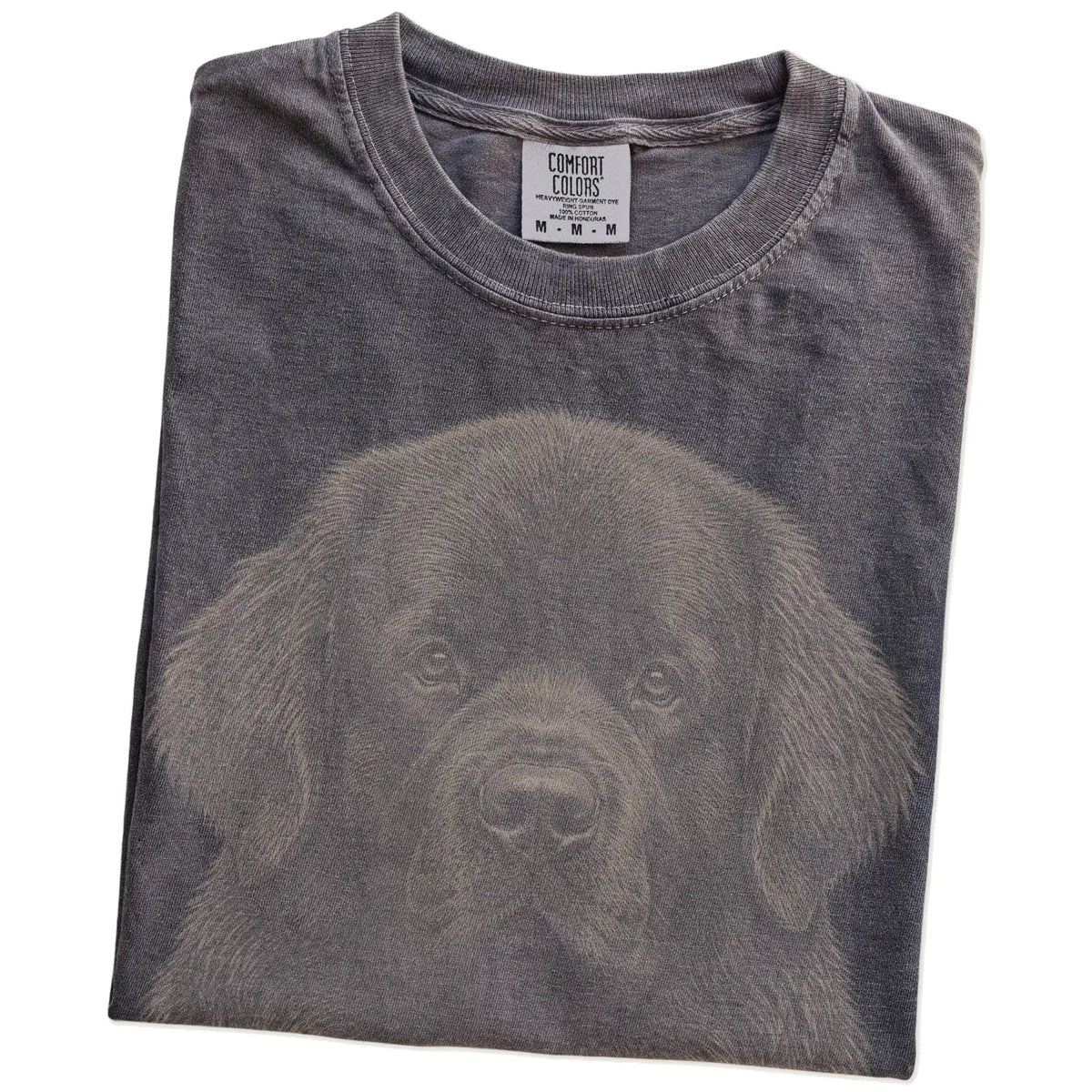 Folded Pepper Comfort Colors® T-shirt showing a realistic drawing of a Newfie