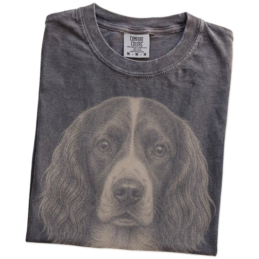 Folded Pepper Comfort Colors® T-shirt showing a realistic drawing of a Springer Spaniel