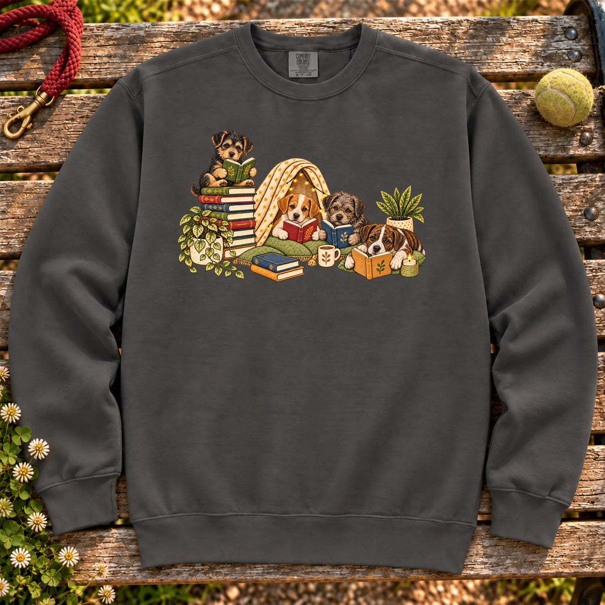 Four rescue puppies reading in a cozy room on Pepper sweatshirt