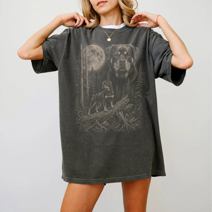 Woman wearing a Pepper Rottweiler Moonlit Forest T-Shirt