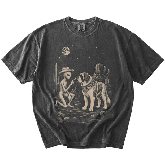 Cowboy alien fist-bumping a Saint Bernard beneath the moon on a Pepper Comfort Colors® T-shirt