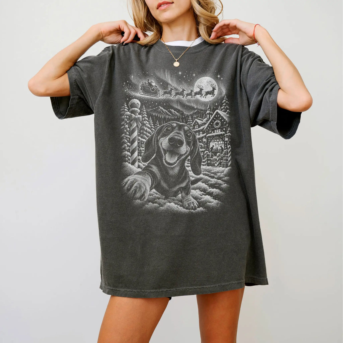 Woman wearing a Pepper Dachshund Santa Selfie T-shirt