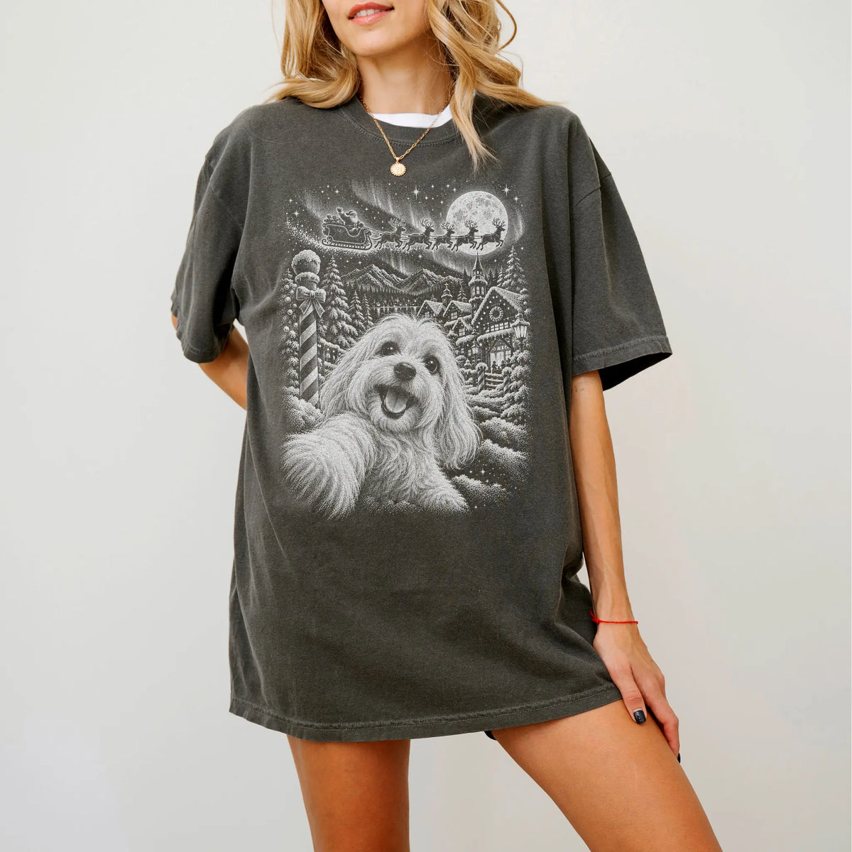 Woman wearing a Pepper Maltese Santa Selfie T-shirt