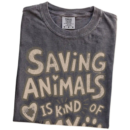 Folded Pepper Comfort Colors® T-shirt showing saving animals is kind of my thing lettering