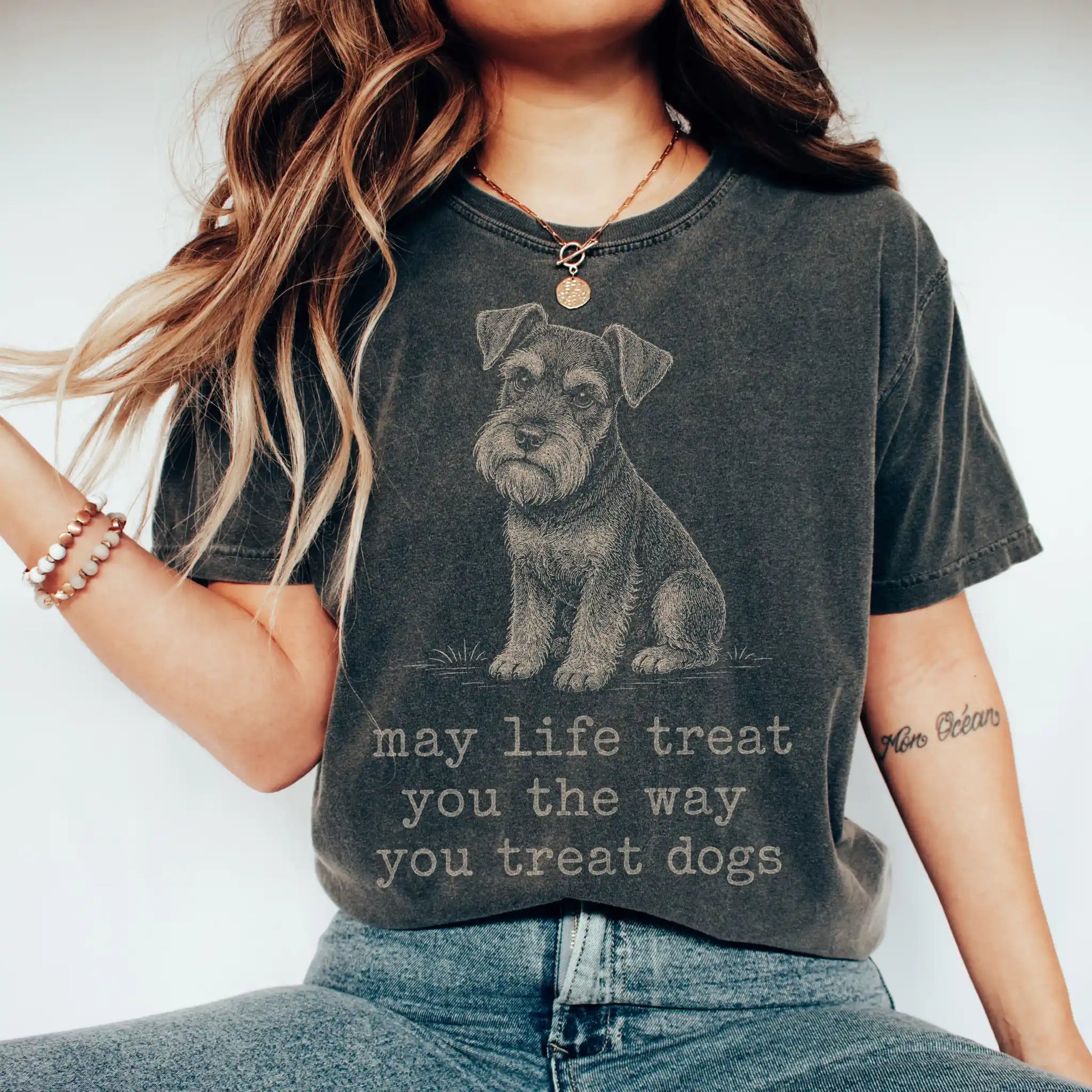 Woman wearing a Pepper Schnauzer Karma T-Shirt