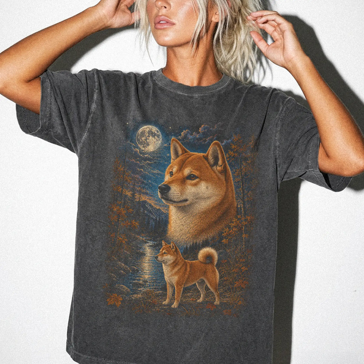 Model wearing a Pepper Comfort Colors® t-shirt featuring Shiba Inu in a moonlit fall forest