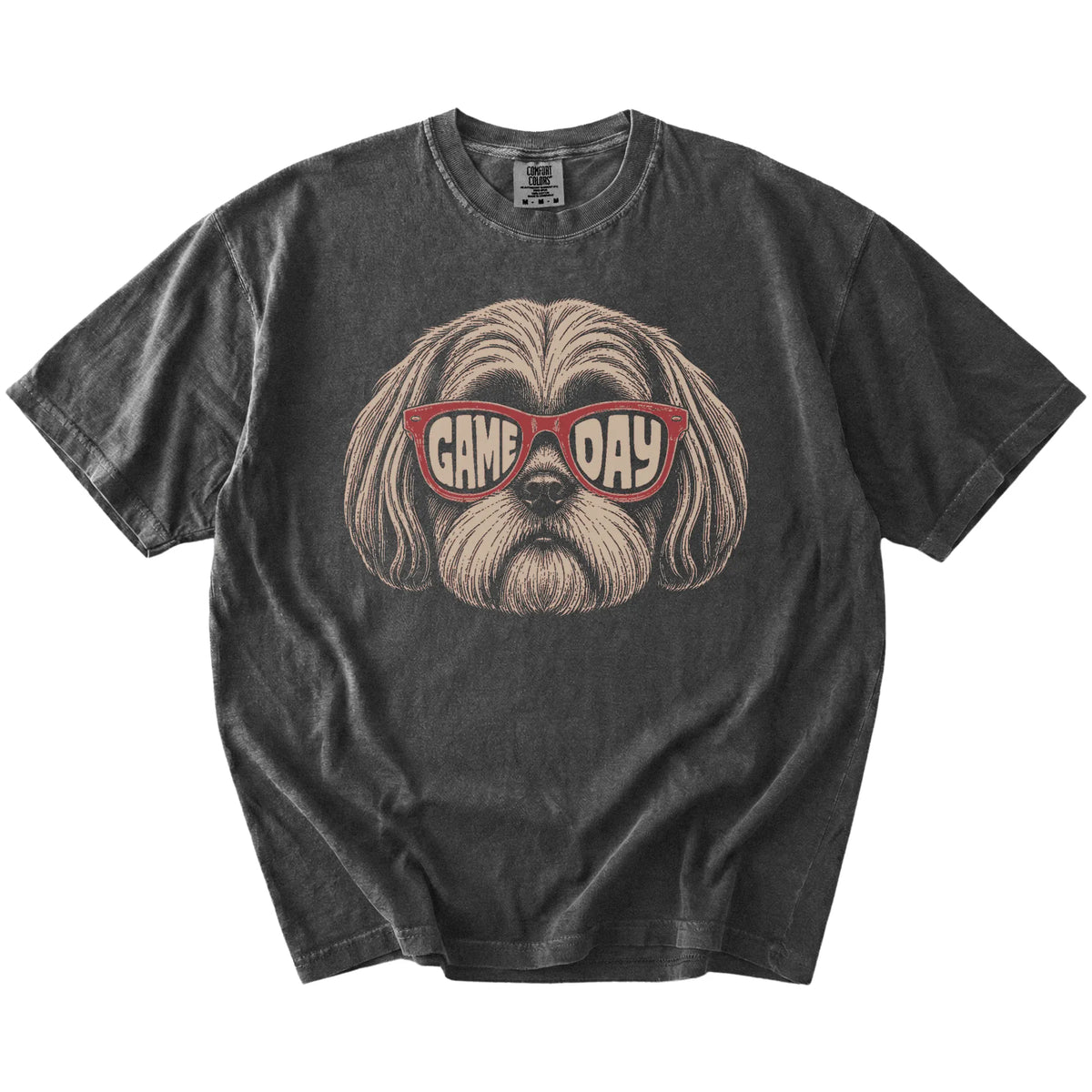 Shih Tzu wearing red Game Day sunglasses on a Pepper Comfort Colors® T-shirt