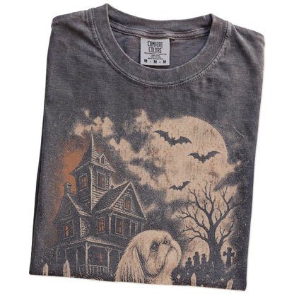 Folded Pepper Comfort Colors® T-shirt showing Shih Tzu in a vintage haunted-house scene
