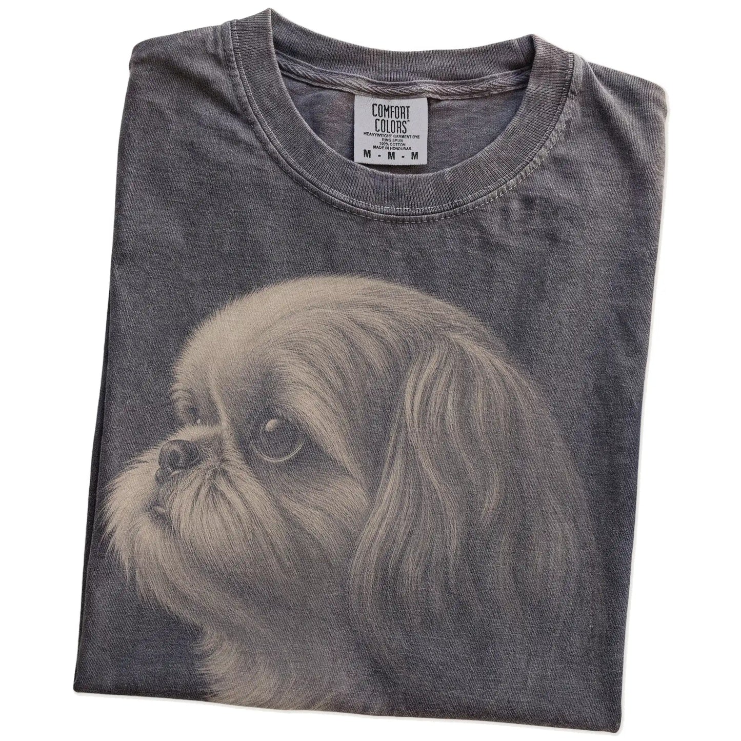 Folded Pepper Comfort Colors® T-shirt showing a detailed photographic portrait of a Shih Tzu