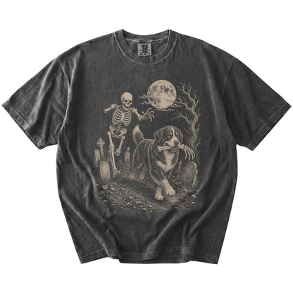 Bernese Mountain Dog running from a skeleton on a Pepper Comfort Colors® T-shirt