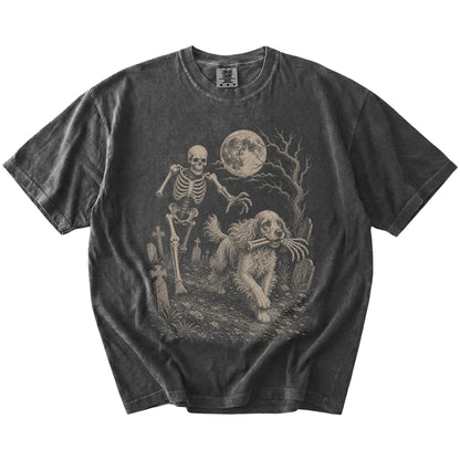 Cocker Spaniel running from a skeleton on a Pepper Comfort Colors® T-shirt