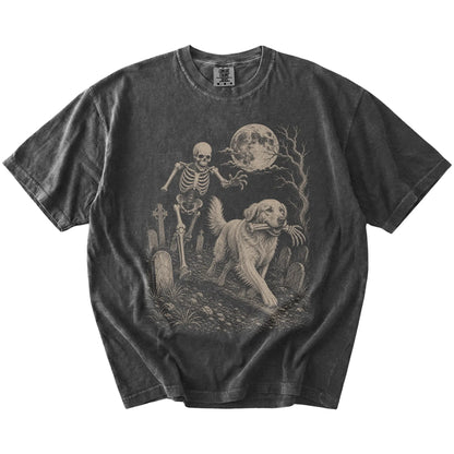 Golden Retriever running from a skeleton on a Pepper Comfort Colors® T-shirt