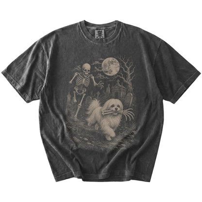 Maltese running from a skeleton on a Pepper Comfort Colors® T-shirt