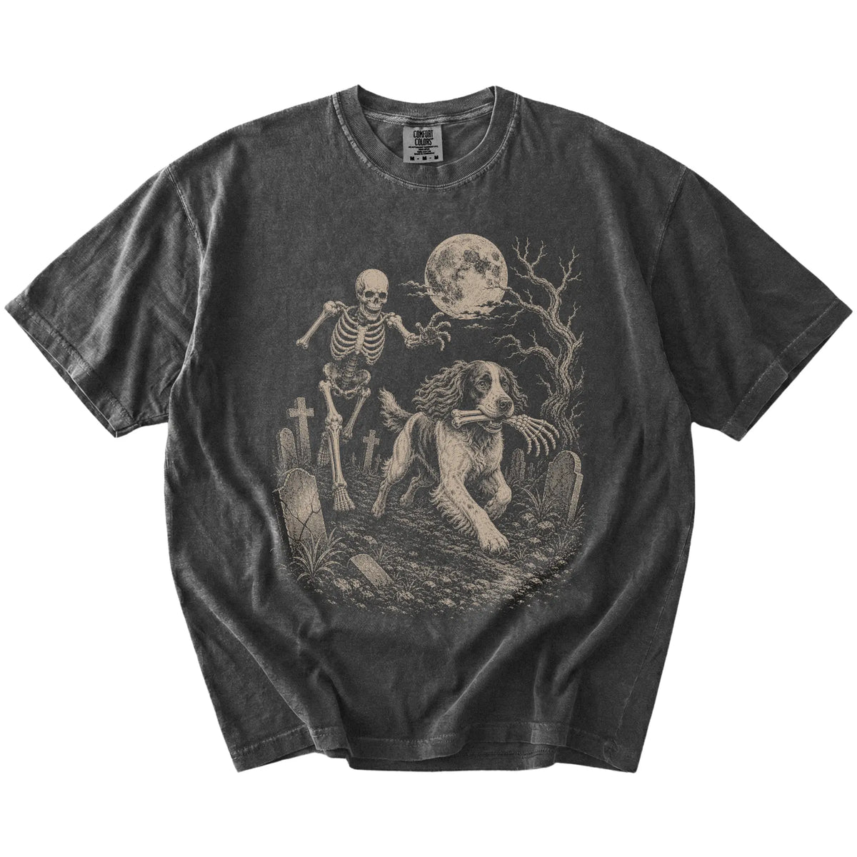 Springer Spaniel running from a skeleton on a Pepper Comfort Colors® T-shirt