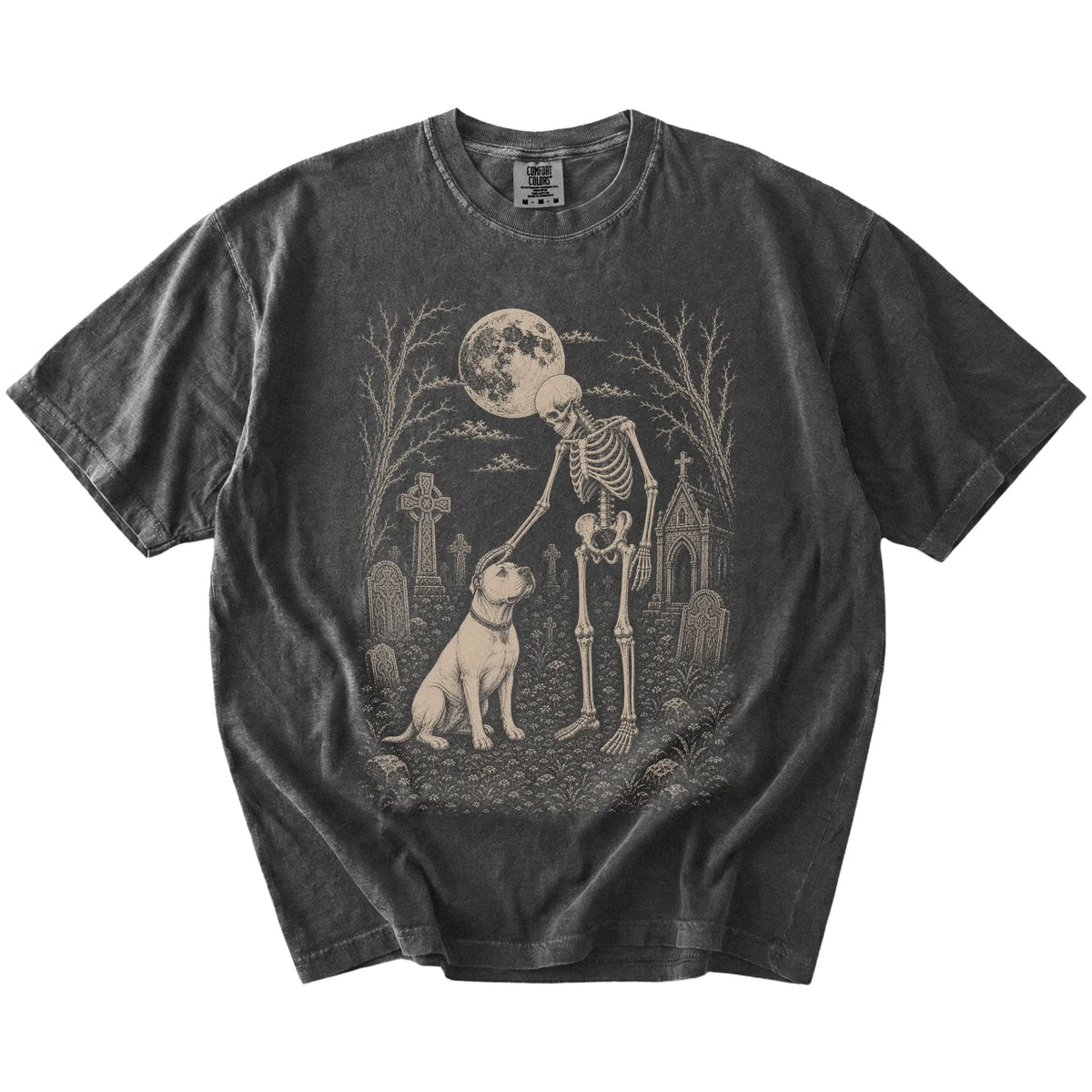 American Bulldog sharing a quiet cemetery moment with a friendly skeleton on a Pepper Comfort Colors® T-shirt
