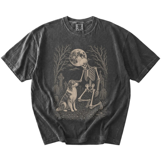 Australian Shepherd sharing a quiet cemetery moment with a friendly skeleton on a Pepper Comfort Colors® T-shirt