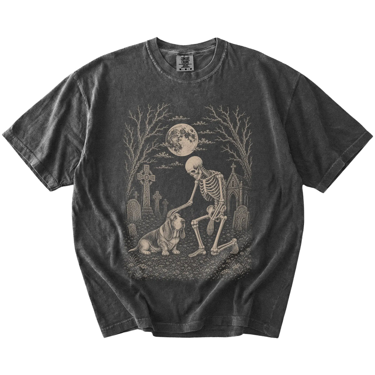 Basset Hound sharing a quiet cemetery moment with a friendly skeleton on a Pepper Comfort Colors® T-shirt