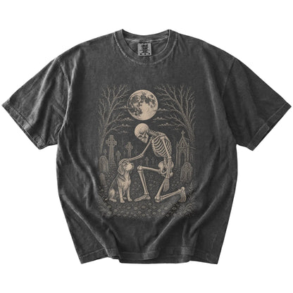 Beagle sharing a quiet cemetery moment with a friendly skeleton on a Pepper Comfort Colors® T-shirt