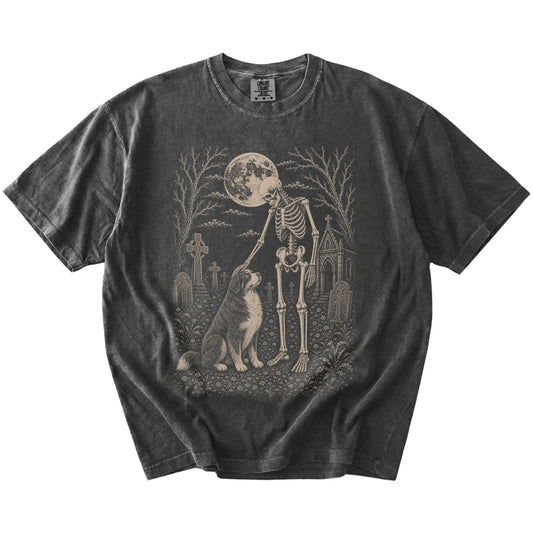 Bernese Mountain Dog sharing a quiet cemetery moment with a friendly skeleton on a Pepper Comfort Colors® T-shirt
