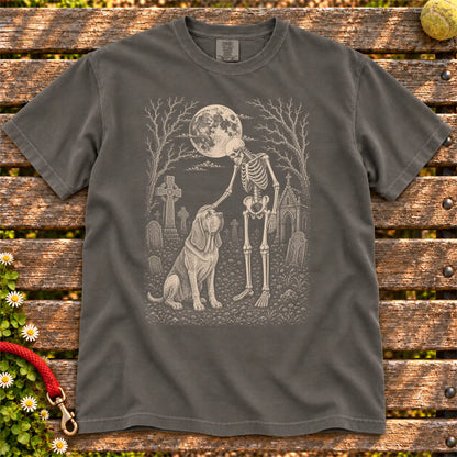 Bloodhound sharing a quiet cemetery moment with a friendly skeleton on a Pepper Comfort Colors® T-shirt
