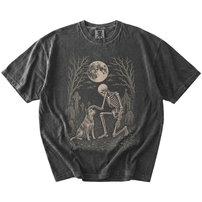 Blue Heeler sharing a quiet cemetery moment with a friendly skeleton on a Pepper Comfort Colors® T-shirt