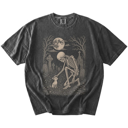 Chihuahua sharing a quiet cemetery moment with a friendly skeleton on a Pepper Comfort Colors® T-shirt