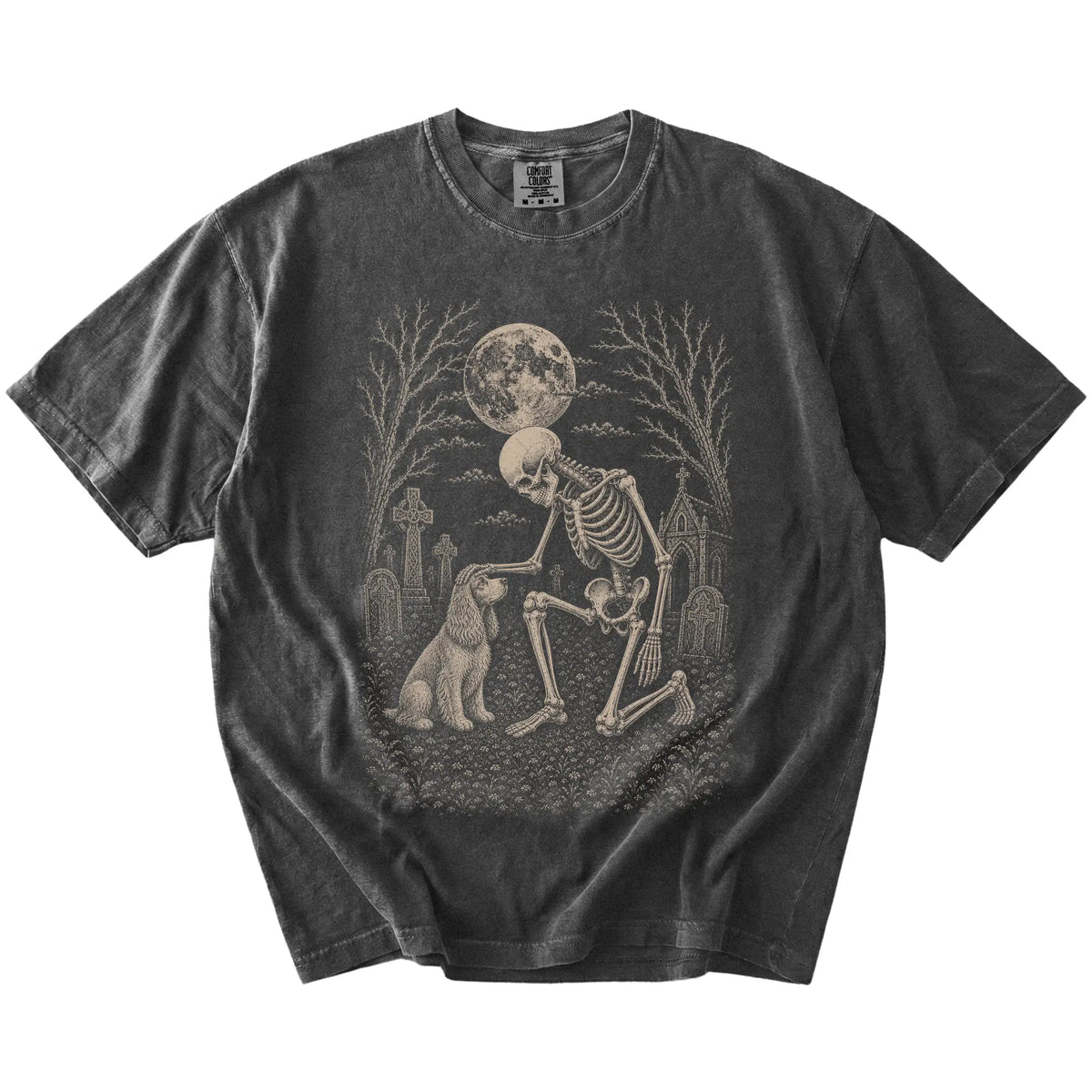 Cocker Spaniel sharing a quiet cemetery moment with a friendly skeleton on a Pepper Comfort Colors® T-shirt