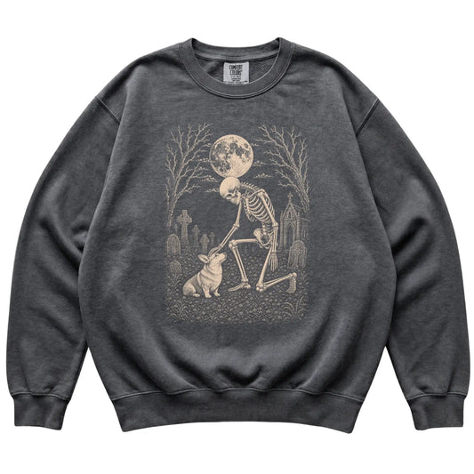 Skeleton petting a Corgi in a graveyard on a Pepper sweatshirt