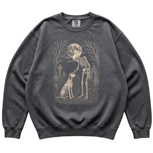 Skeleton petting a Dalmatian in a graveyard on a Pepper sweatshirt