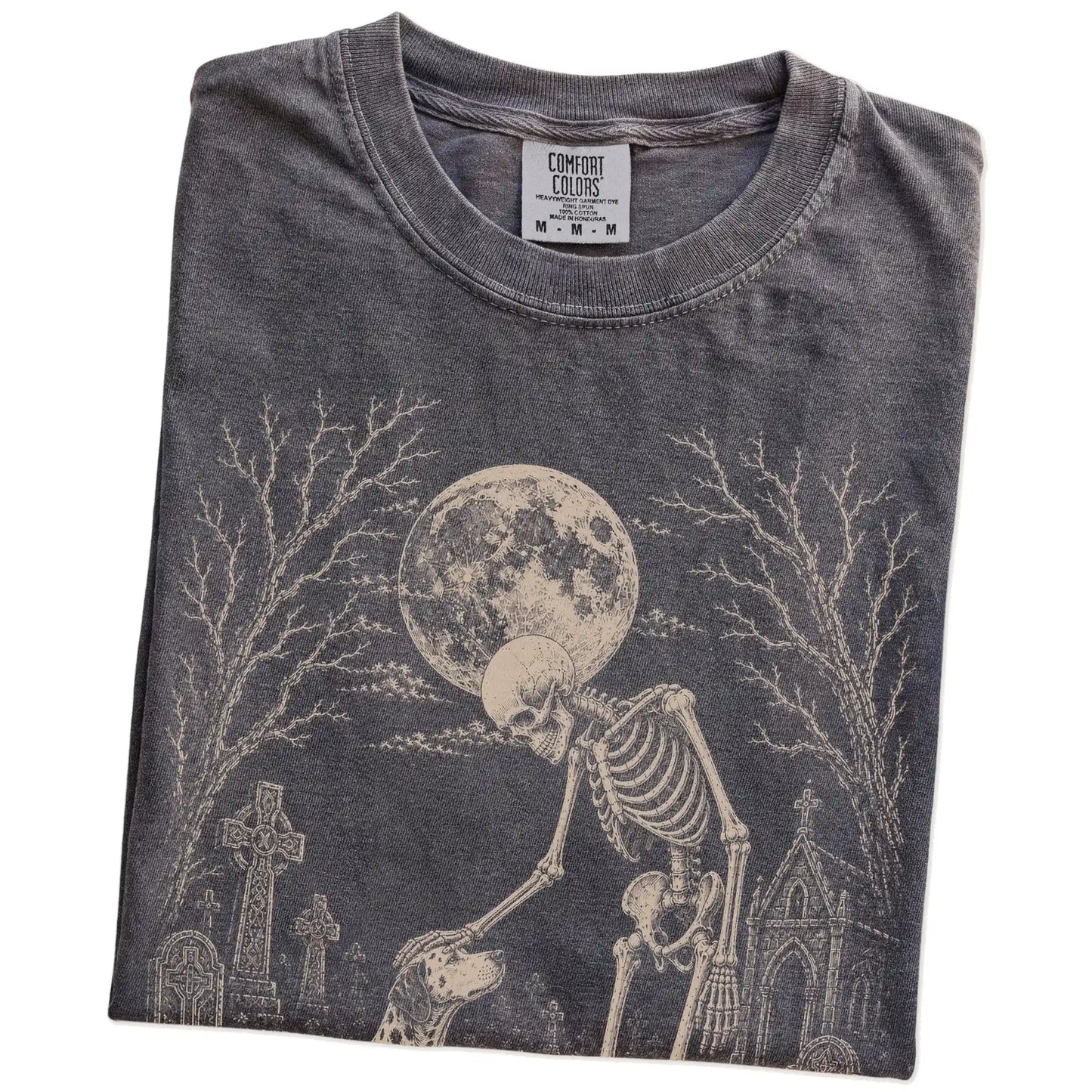 Folded Pepper Comfort Colors® T-shirt showing Dalmatian sharing a quiet cemetery moment with a friendly skeleton