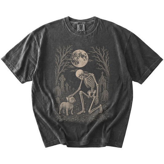 French Bulldog sharing a quiet cemetery moment with a friendly skeleton on a Pepper Comfort Colors® T-shirt
