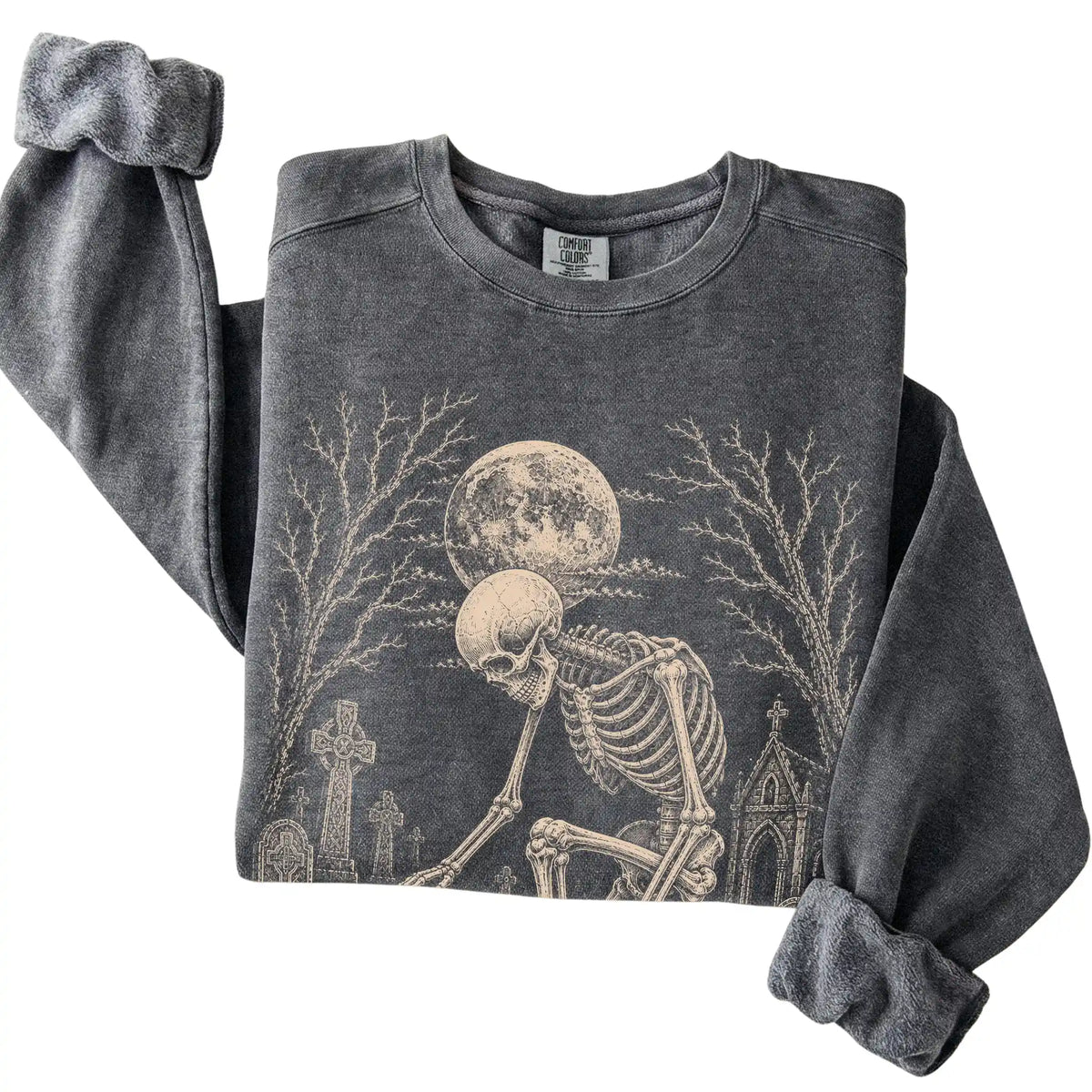 Folded Pepper sweatshirt with a skeleton petting a Havanese in a graveyard