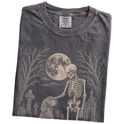 Folded Pepper Comfort Colors® T-shirt showing Irish Setter sharing a quiet cemetery moment with a friendly skeleton