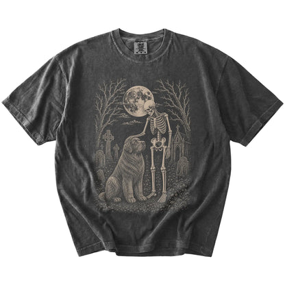 Newfie sharing a quiet cemetery moment with a friendly skeleton on a Pepper Comfort Colors® T-shirt
