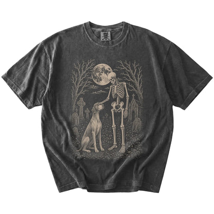 Pointer sharing a quiet cemetery moment with a friendly skeleton on a Pepper Comfort Colors® T-shirt