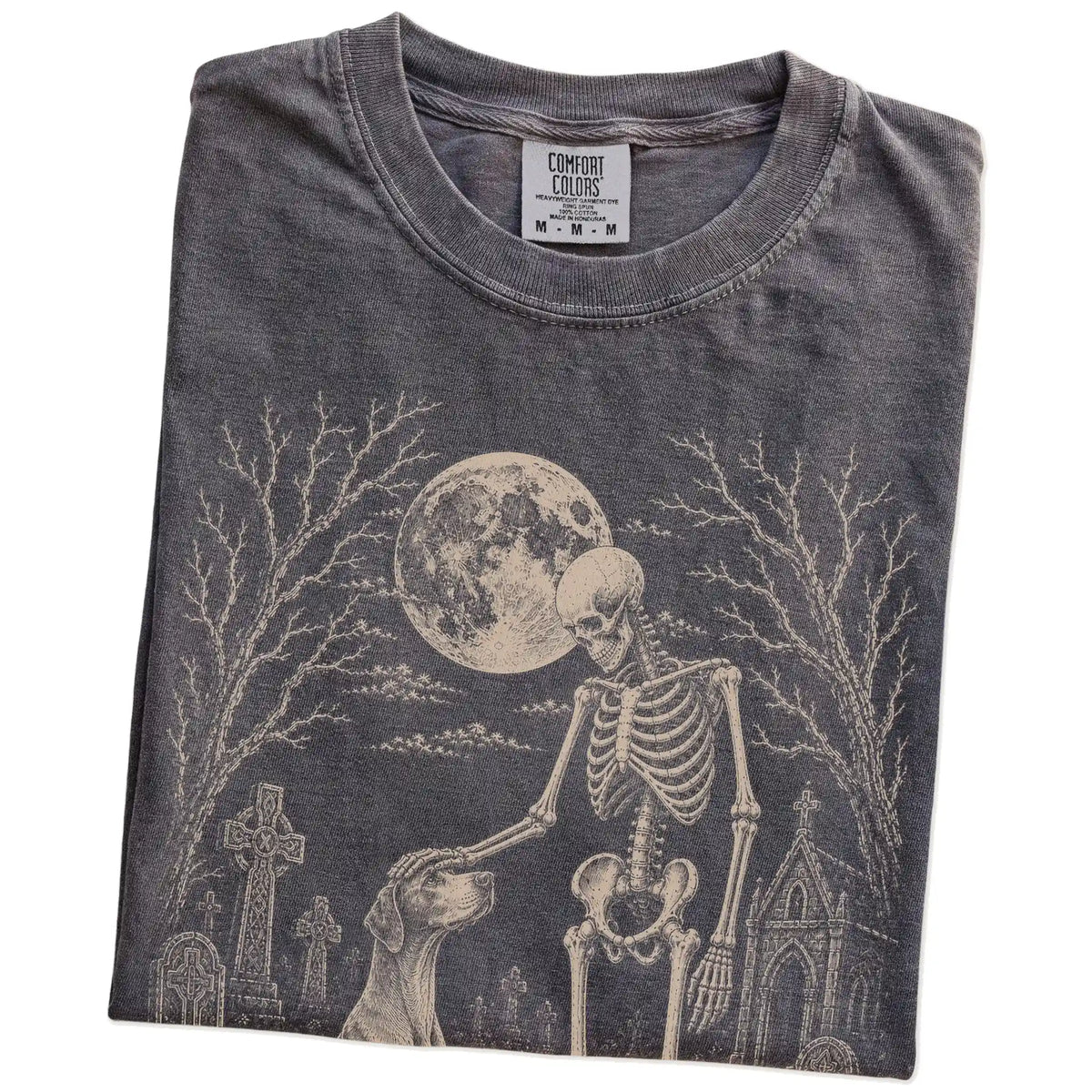 Folded Pepper Comfort Colors® T-shirt showing Pointer sharing a quiet cemetery moment with a friendly skeleton