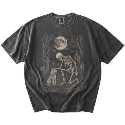 Poodle sharing a quiet cemetery moment with a friendly skeleton on a Pepper Comfort Colors® T-shirt