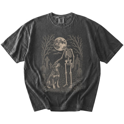 Rottweiler sharing a quiet cemetery moment with a friendly skeleton on a Pepper Comfort Colors® T-shirt