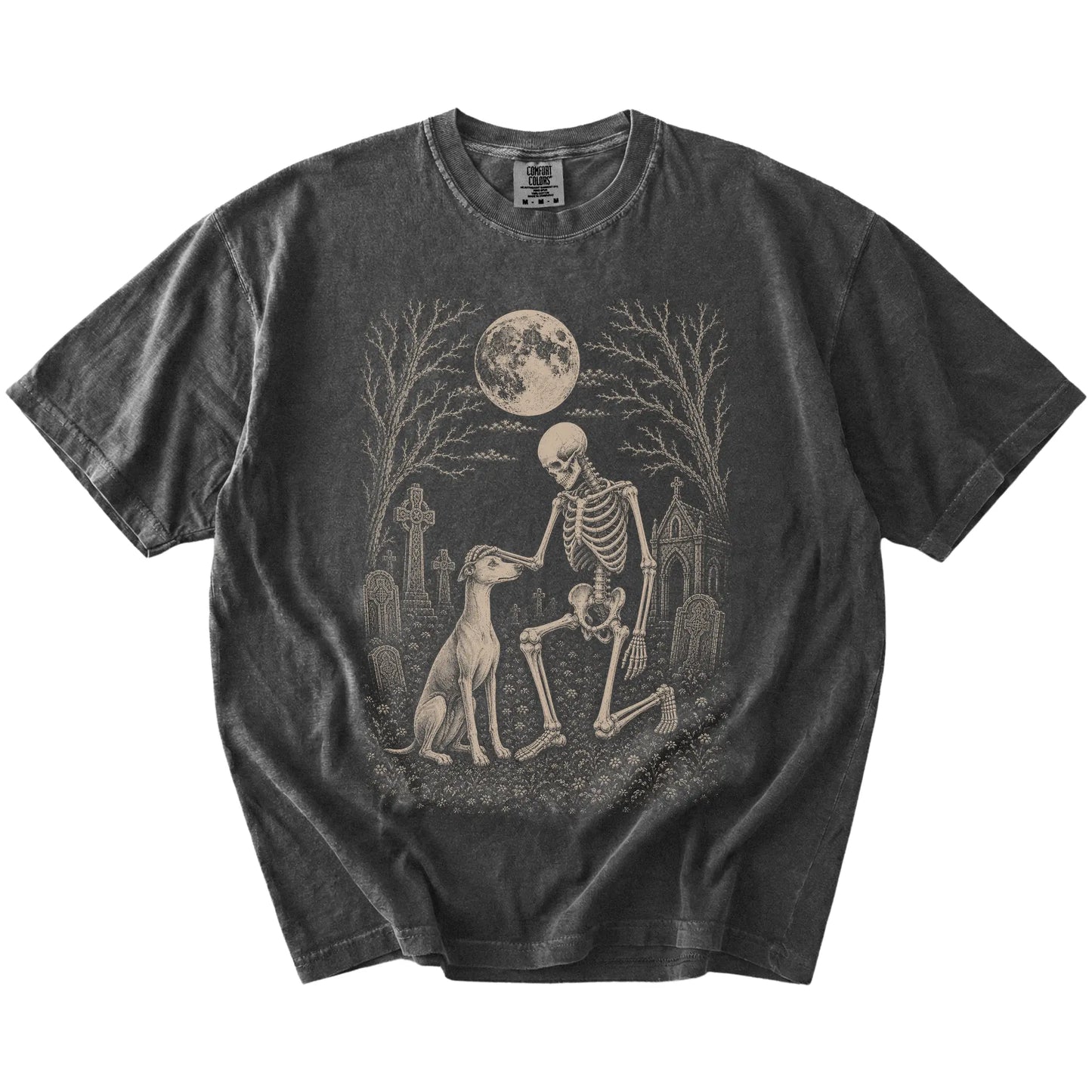 Whippet sharing a quiet cemetery moment with a friendly skeleton on a Pepper Comfort Colors® T-shirt