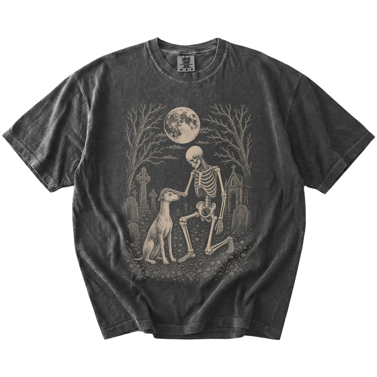 Whippet sharing a quiet cemetery moment with a friendly skeleton on a Pepper Comfort Colors® T-shirt
