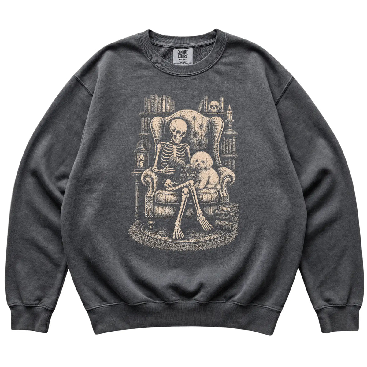 Skeleton reading Tales Beyond to a Bichon Frise on a Pepper sweatshirt