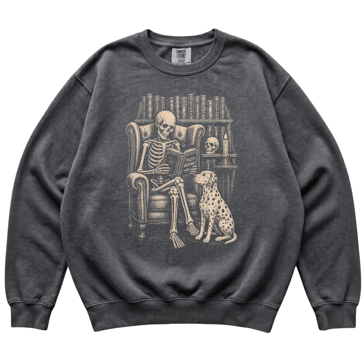 Skeleton reading Tales Beyond to a Dalmatian on a Pepper sweatshirt