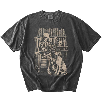 Skeleton reading in a library beside a Pointer on a Pepper Comfort Colors® T-shirt