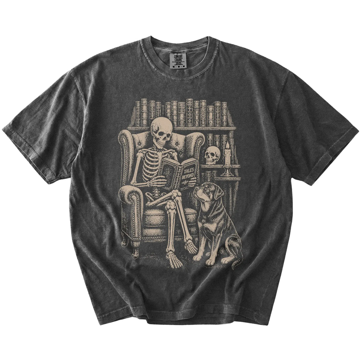 Skeleton reading in a library beside a Rottweiler on a Pepper Comfort Colors® T-shirt